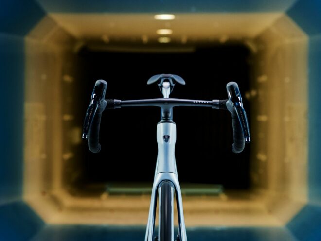 Head-on shot of Madone handlebars with wind tunnel in background