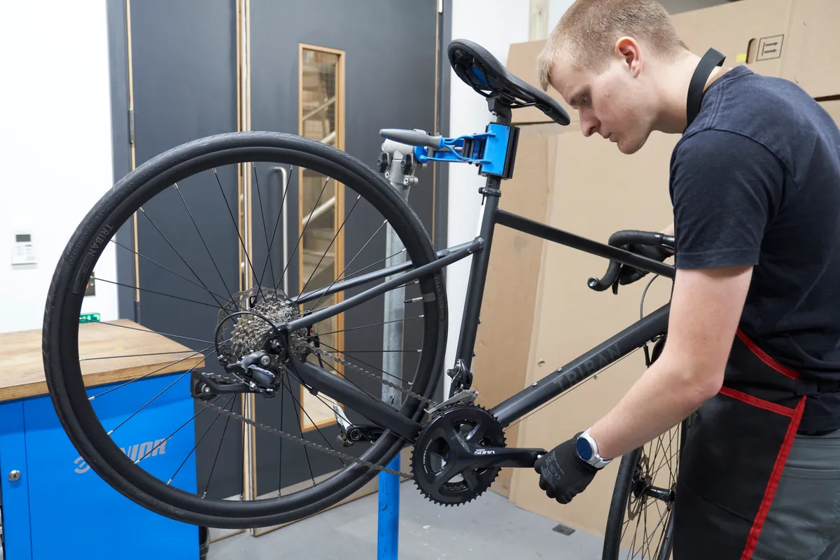 Oscar Huckle adjusting gears on Triban bike Oscar Huckle adjusting gears on Triban bike