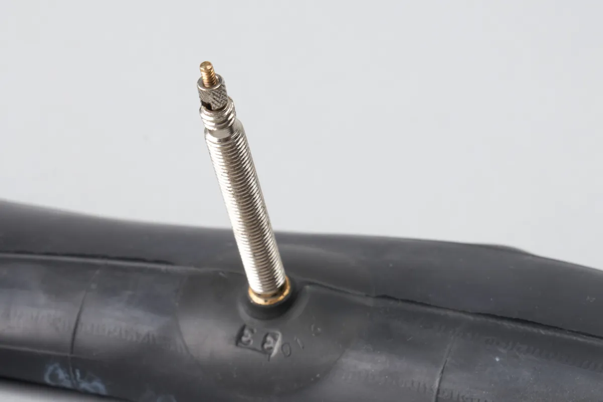 Presta valve against a white background