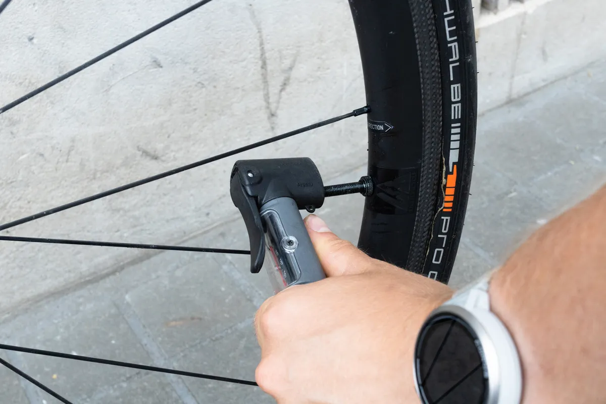 How to pump up a bicycle tyre step-by-step guide (11 of 12) Inflating a Presta valve