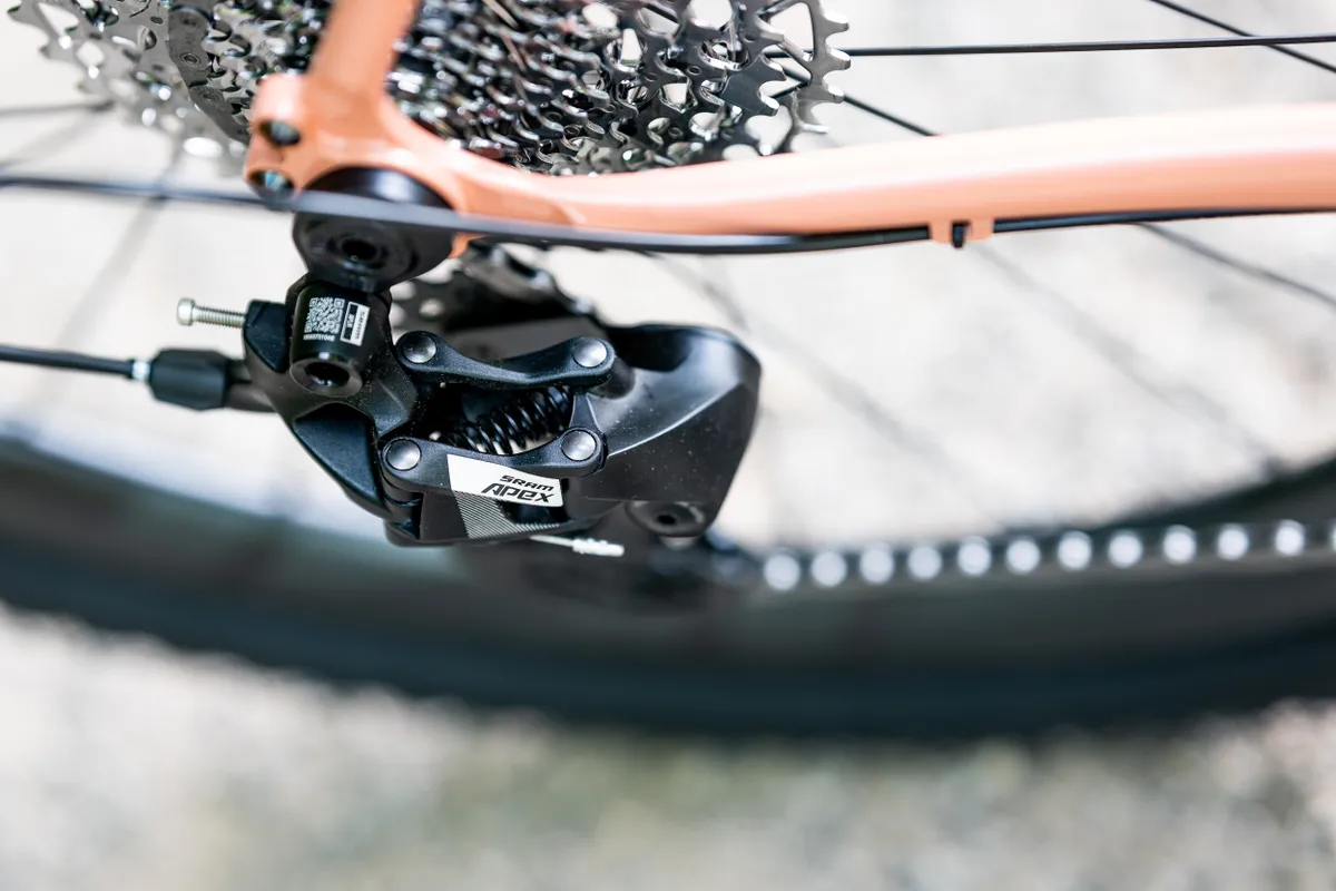 SRAM Apex XPLR 1x mechanical rear derailleur and cassette on a gravel bike SRAM Apex XPLR 1x mechanical rear derailleur and cassette on a gravel bike