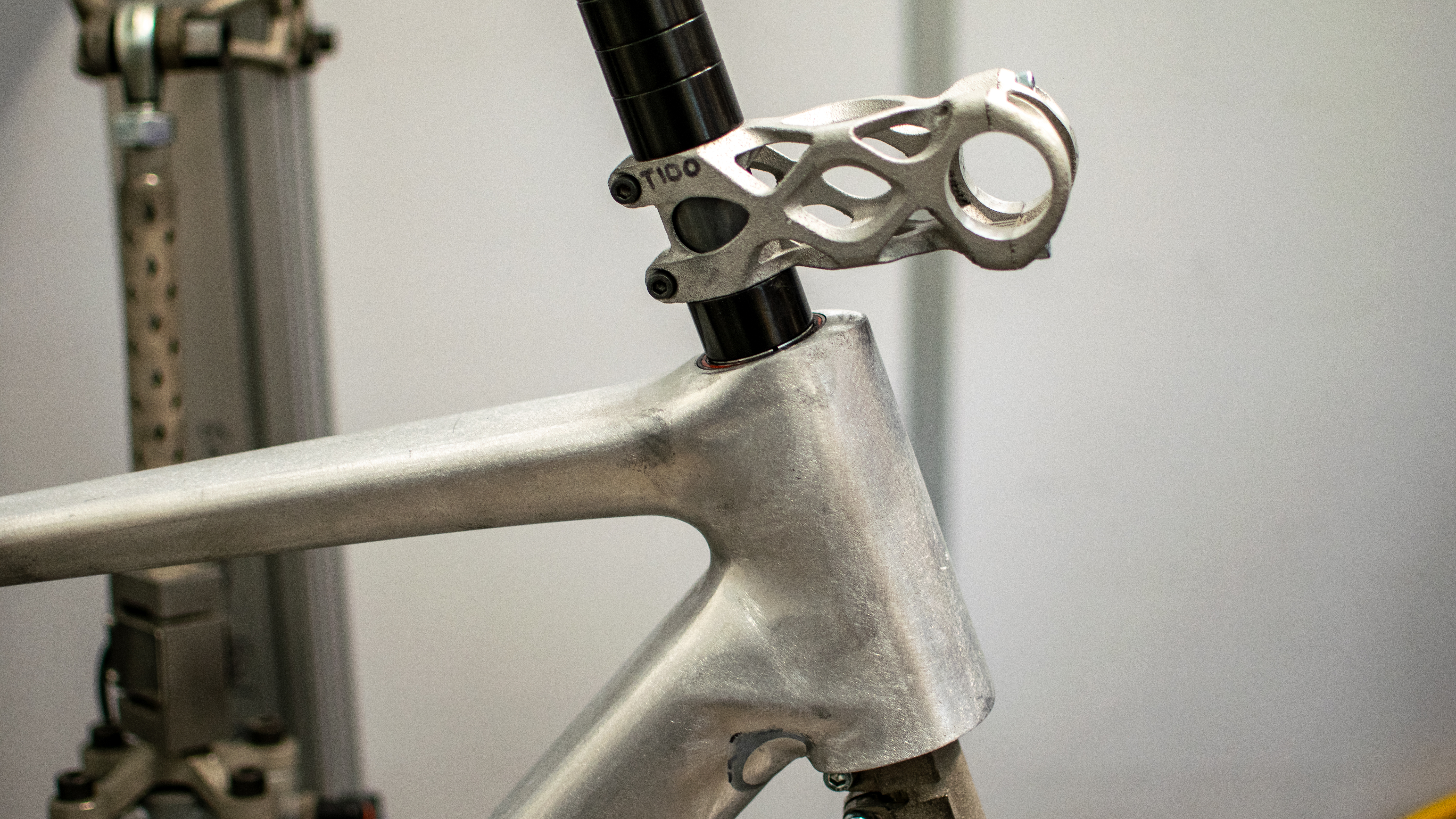 A Mythos 3D printed frame in a test jig 