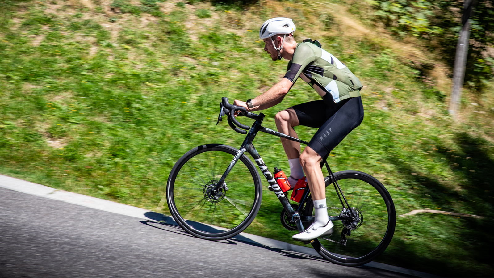 Factor O2 VAM Disc being ridden up a hill