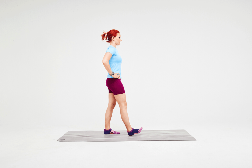 a person doing a dynamic hamstring stretch