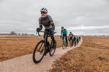 group of male friends cycling for exercise