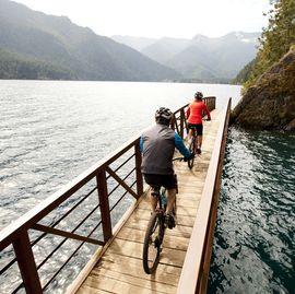 a man a woman bike riding.