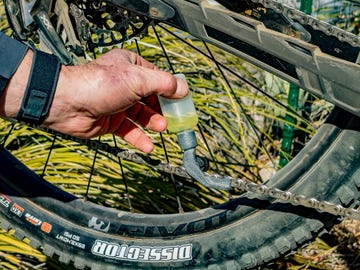 a tool lubricating a bicycle chain