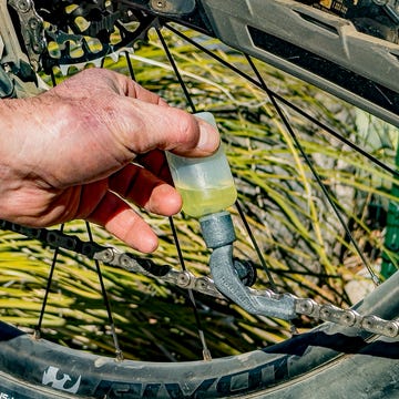 a tool lubricating a bicycle chain a tool lubricating a bicycle chain