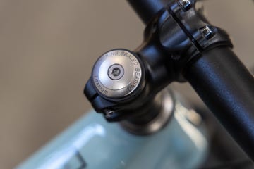 bicycle headset component with a titanium bearing